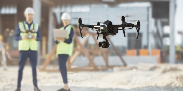 Drone on a construction site with Dussmann employees 